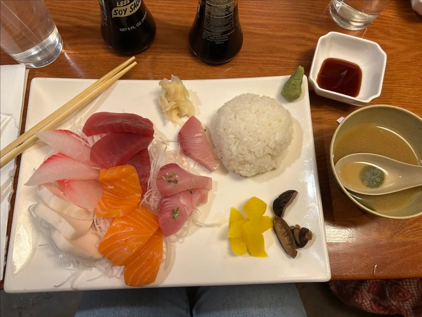 Sashimi plate with tuna, salmon, yellowtail and white fish, rice, pickles and miso soup
